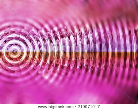 Resonate ,spread, vibration or ripple red/pink abstract