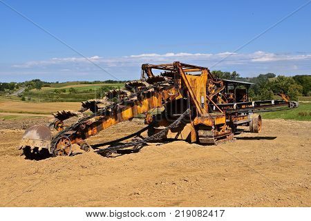 An antique trencher for digging trenches deep into the ground.