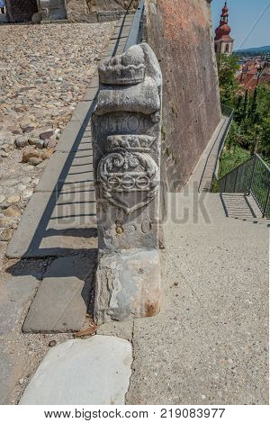 Ptuj / Slovenia - August 17, 2017: A milestone next to the castle in Ptuj in the summer of 2017