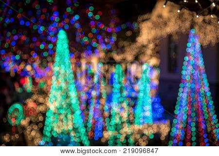 Many abstract Christmas tree lighting in the night