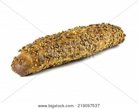 Freshly baked bread from wheat flour with sunflower seeds, pumpkin, sesame isolated on a white background. Baking for a healthy diet.