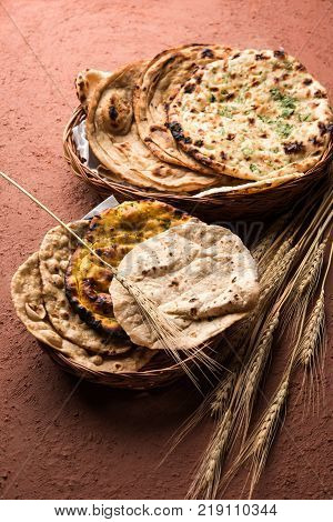 Assorted Indian Bread Basket includes chapati, tandoori roti or naan, paratha, kulcha, fulka, missi roti