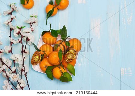 Top View Accessories Chinese New Year Festival Decorations.orange,leaf On Blue Background