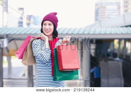 Portrait beautiful young girl russian enjoying smell traval in winter bangkok city thailand