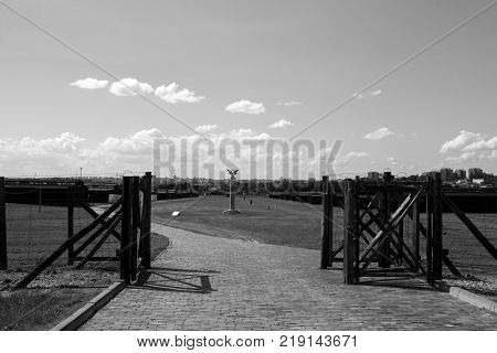 Black and white photo entrance to the Majdanek concentration camp