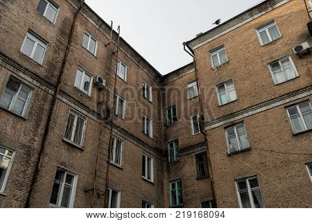 Old building fragment. Old apartment buildings in Ust-Kamenogorsk Kazakhstan