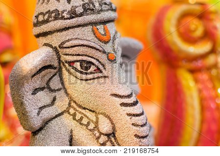 Colorful dolls made of clay Lord Ganesha handicrafts on display during the Handicraft Fair in Kolkata earlier Calcutta West Bengal India. It is the biggest handicrafts fair in Asia.