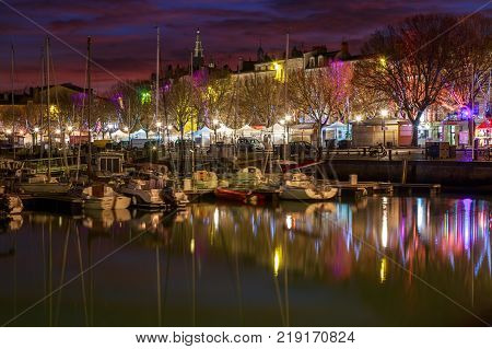 Harbor by night with beautiful sunset in La Rochelle Town