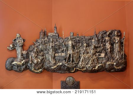 ZAGREB, CROATIA - MARCH 31: Bass relief with churches and patron saints of Gradec, the old part of Zagreb in Chapel of Saint Dismas in Zagreb, Croatia on March 31, 2015