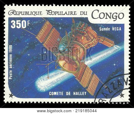 Kiev, Ukraine, December 22, 2017: Stamp printed by Congo Color memorable Air mail edition offset printing on topic  devoted Halley Comet shows Sonde Vega in the Space, CIRCA 1986