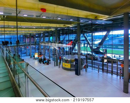 Cologne, Germany - December 12, 2017: The people going at Cologne Bonn Airport at Cologne, Germany on December 12, 2017.