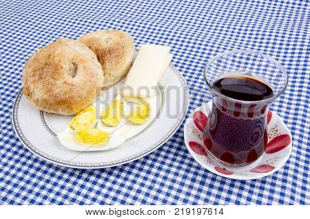 Turkish Borek Boyoz with egg and tea.