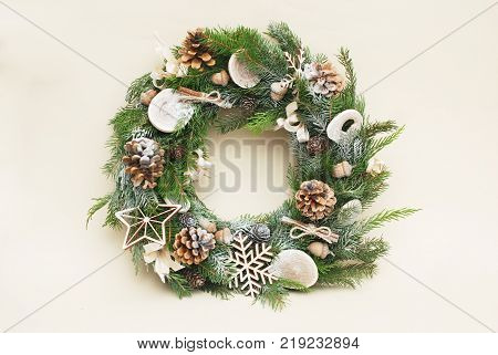 Green christmas wreath with decorations isolated on