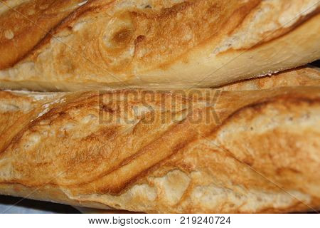 A baguette either simply baguette, so called baguette of Paris, or still French loaf, but also bread baguette is a variety of bread, recognizable in its lengthened (stretched out) shape. Even if this shape of bread is symbolic of France, the baguette is a