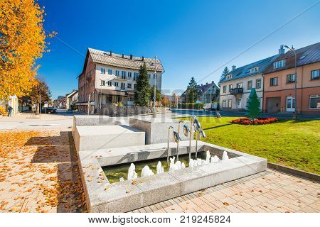 Street and public fountain in the center of Delnice, small town in Gorski kotar, Croatia