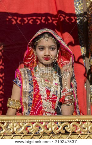 JAISALMER INDIA - FEBRUARY 08 2017 : Indian girl wearing traditional Rajasthani dress participate in Desert Festival in Jaisalmer Rajasthan India