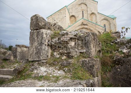 Ruins of old castle. Ancient old stone wall time destroys and age. Old Ruined Farmstead and Stone Walls