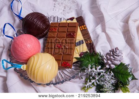 Homemade Chocolate Bar  . Handmade Sweets On White Textile Background.