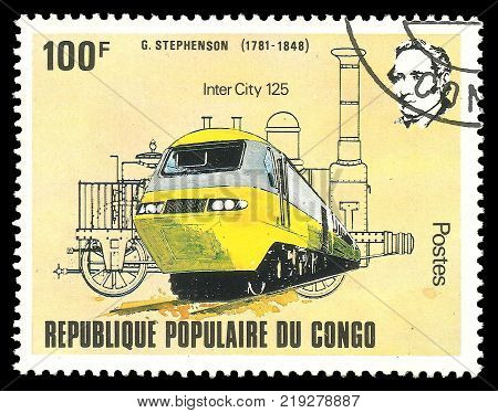 Kiev Ukraine December 22 2017: Stamp printed by Congo Color edition on topic of Railway devoted 200th birthday of George Stephenson shows train Intercity CIRCA 1982