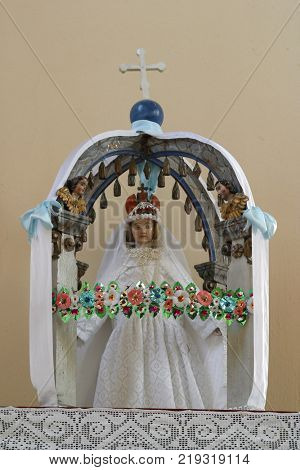 CVETLIN, CROATIA - NOVEMBER 08: Virgun Mary, statue on the church altar in Saint Peter and Paul church in Cvetlin, Croatia on November 08, 2011.