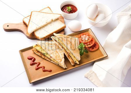 Indian Bread omelette / omlet / omlete sandwich served with tomato ketchup
