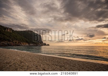 Beautiful Kleopatra Beach In Alanya At Sunset With Dramatic Sky And Clouds.