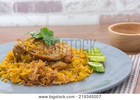 Chicken Biryani with rice and sauce. halal food (Khao Mok Gai)