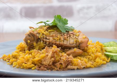 Chicken Biryani with rice and sauce. halal food (Khao Mok Gai)