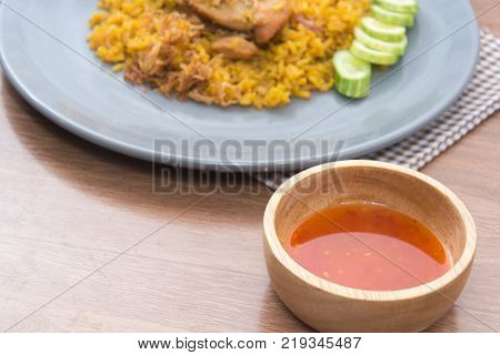 Chicken Biryani with rice and sauce. halal food (Khao Mok Gai)