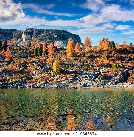 Splendid view of Limides Lake. Colorful autumn morning in Dolomite Alps Falzarego pass Cortina d'Ampezzo lacattion Italy Europe. Artistic style post processed photo.