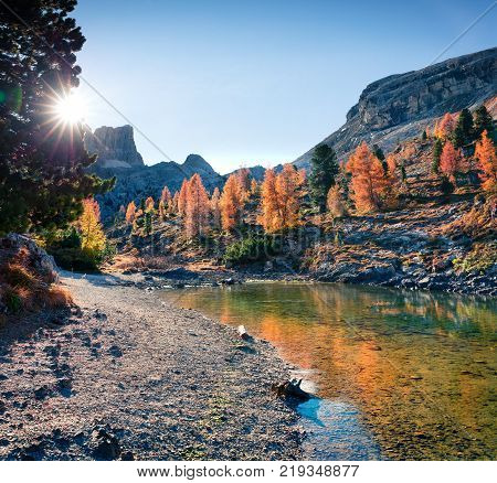 Splendid view of Limides Lake. Colorful autumn morning in Dolomite Alps Falzarego pass Cortina d'Ampezzo lacattion Italy Europe. Artistic style post processed photo.