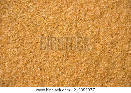 Background. Sand close up with large grains of sand