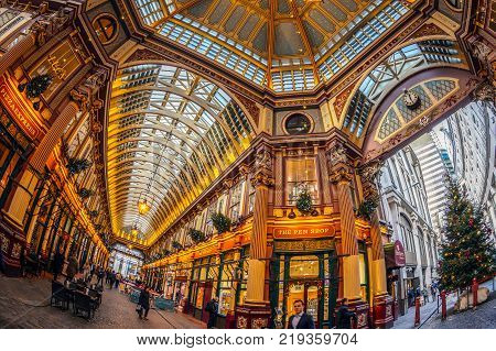 LONDON ENGLAND - NOVEMBER 27 2017: Inside of the Leadenhall market with covered roof and shopping arcade one of the oldest markets in London dating back to the 14th century.