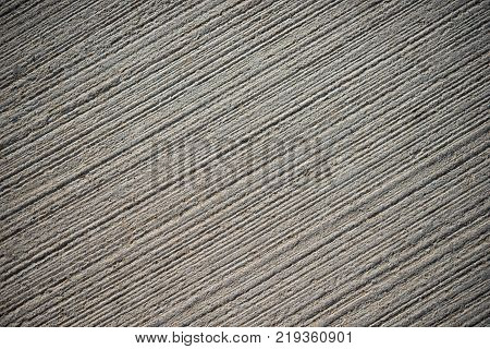 Concrete gray abstract background with lined texture