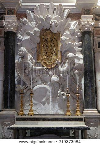 LUCCA, ITALY - JUNE 03: Altar in Chapel Cenami, high relief of Giovanni Baratta, Basilica of San Frediano, Lucca, Tuscany, Italy on June 03, 2017.