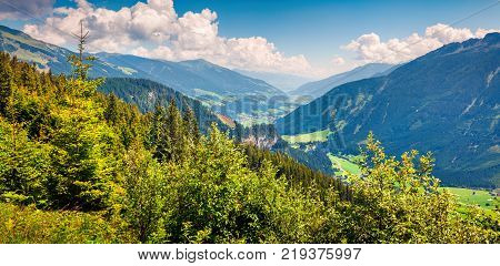 Sunny morning panorama from Gerlos pass of Vorderkrimml village. Colorful summer landscape in Austrian Alps Zell am See district state of Salzburg in Austria Europe. Artistic style post processed photo.