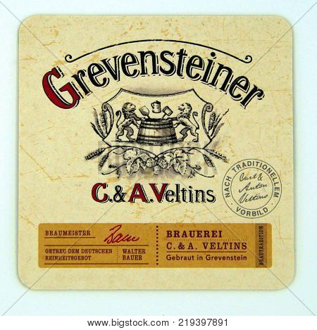 Amsterdam, The Netherlands - December 23, 2017: Veltins Grevensteiner beer coaster from brewery C & A Veltins, Germany.