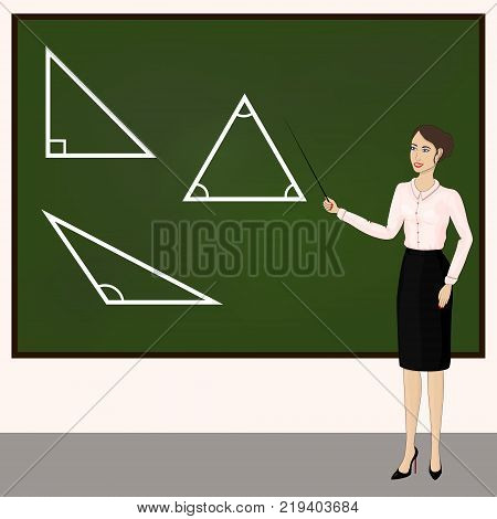 Young school teacher. The teacher leads the lesson.