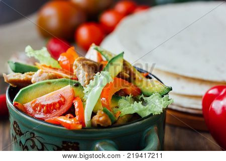 Vegetarian variant of mexican fachitos on wooden board.