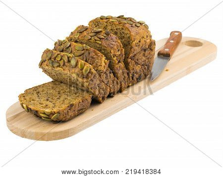 Freshly baked bread from wheat flour with sunflower seeds pumpkin sesame isolated on a white background. Baking for a healthy diet.