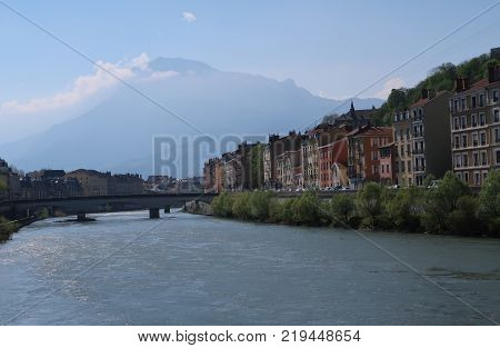 View on the Isère river and the city of Grenoble, France