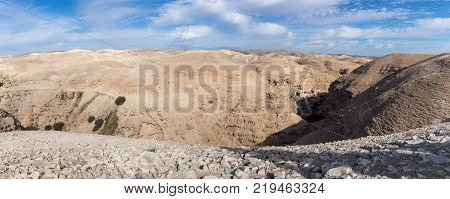 Panoramic view of the Wadi Kelt canyon with a viewing platform near Mizpe Jerojo in Israel