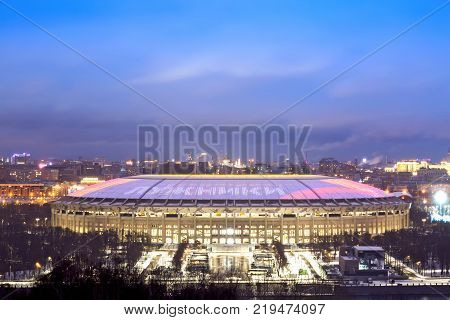 MOSCOW, RUSSIA - DECEMBER, 2017: Luzhniki stadium in Moscow during blue hour in the evening. 2018 FIFA World Cup final game stadium.
