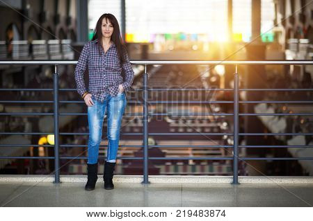 happy woman standing in a shopping mall. full length.