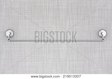 Long New Stainless Steel Towel Holder Rack Against white wallpaper background. 3d Rendering