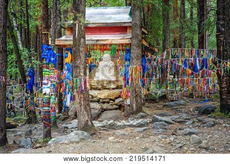 Statue Sagaan Ubgen White Old Man is near Source of mineral water in Arshan. Buryatia. Russia