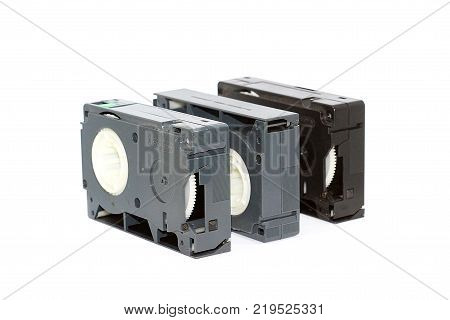 VHS-C small video cassettes isolated on white background.