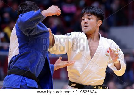 ST. PETERSBURG, RUSSIA - DECEMBER 16, 2017: Final fight Soichi Hashimoto, Japan (white) vs Lasha Shavdatuashvili, Georgia during Judo World Masters tour. Hashimoto won gold medal