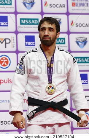 ST. PETERSBURG, RUSSIA - DECEMBER 17, 2017: Khasan Khalmurzaev, Russia during award ceremony of Judo World Masters 2017. Khalmurzaev won gold medal in Men U81