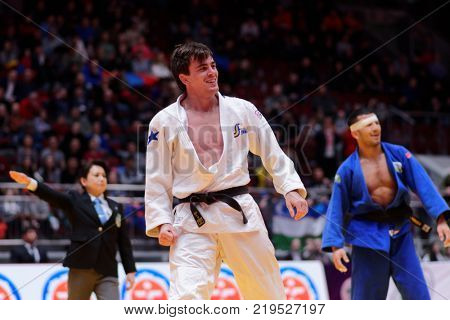 ST. PETERSBURG, RUSSIA - DECEMBER 16, 2017: Fight for 3rd place Tommy Macias, Sweden (white) vs Giyosjon Boboev, Uzbekistan during Judo World Masters tour. Macias won bronze medal